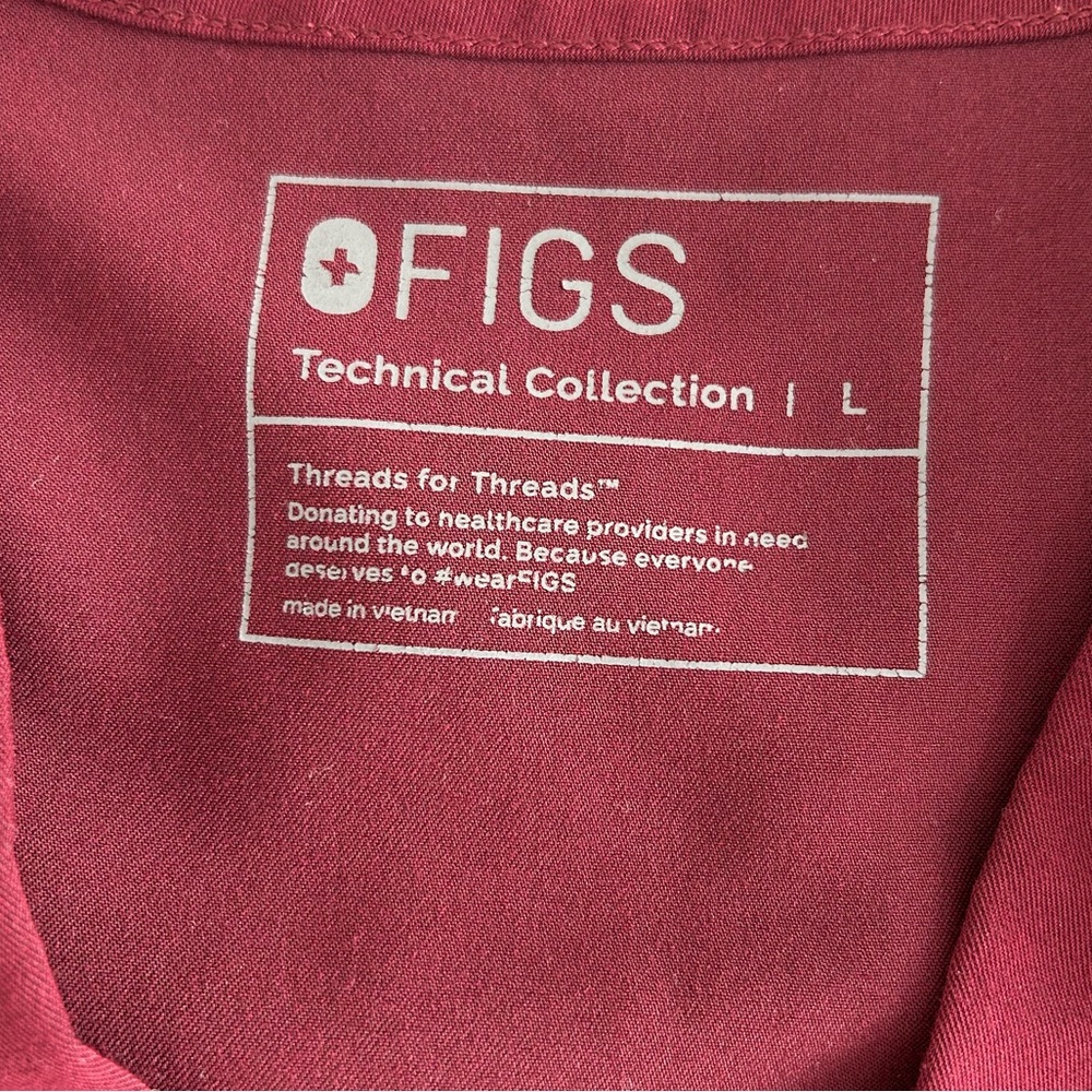 Women’s Figs Scrubs in Burgundy- Technical Collection- size Large- 2 sets